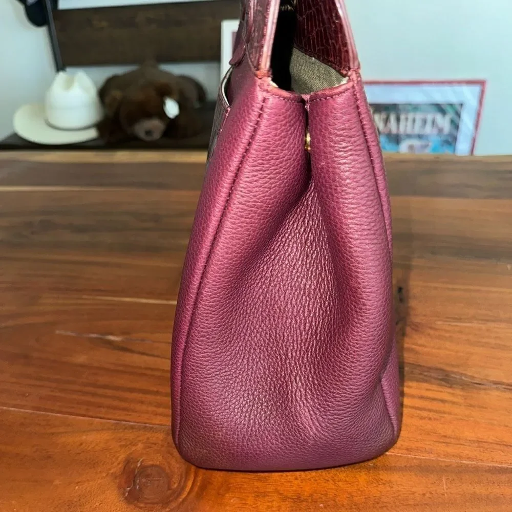 Issac Mizrahi leather handbag with large faux croc pocket.   Magnetic closure